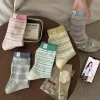 One-piece delivery service for spring and summer striped fabric label kitten socks, women's mid-calf socks, ins trendy Japanese style retro couple sports summer cotton socks full image
